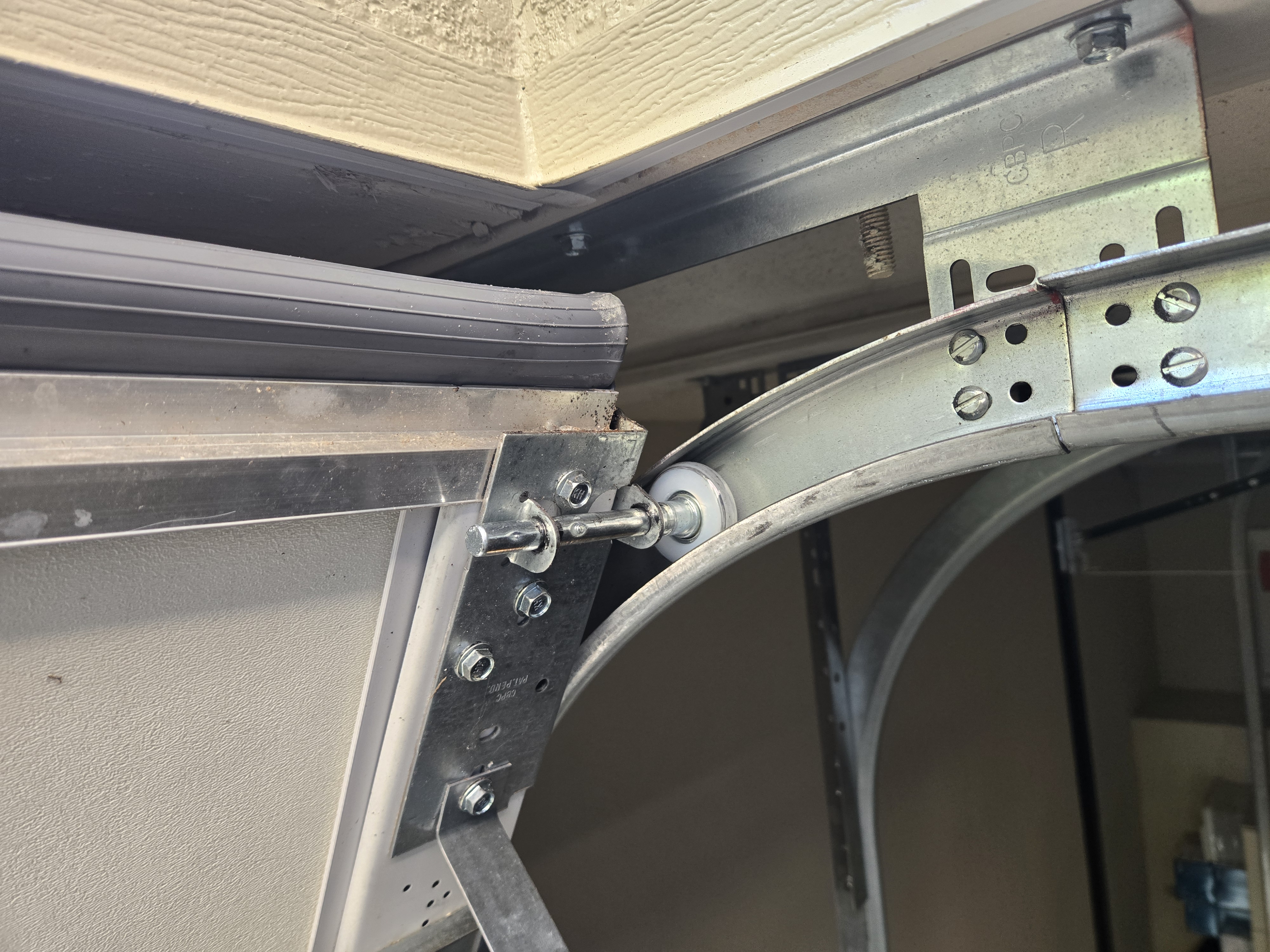 New smooth-rolling garage door roller after service