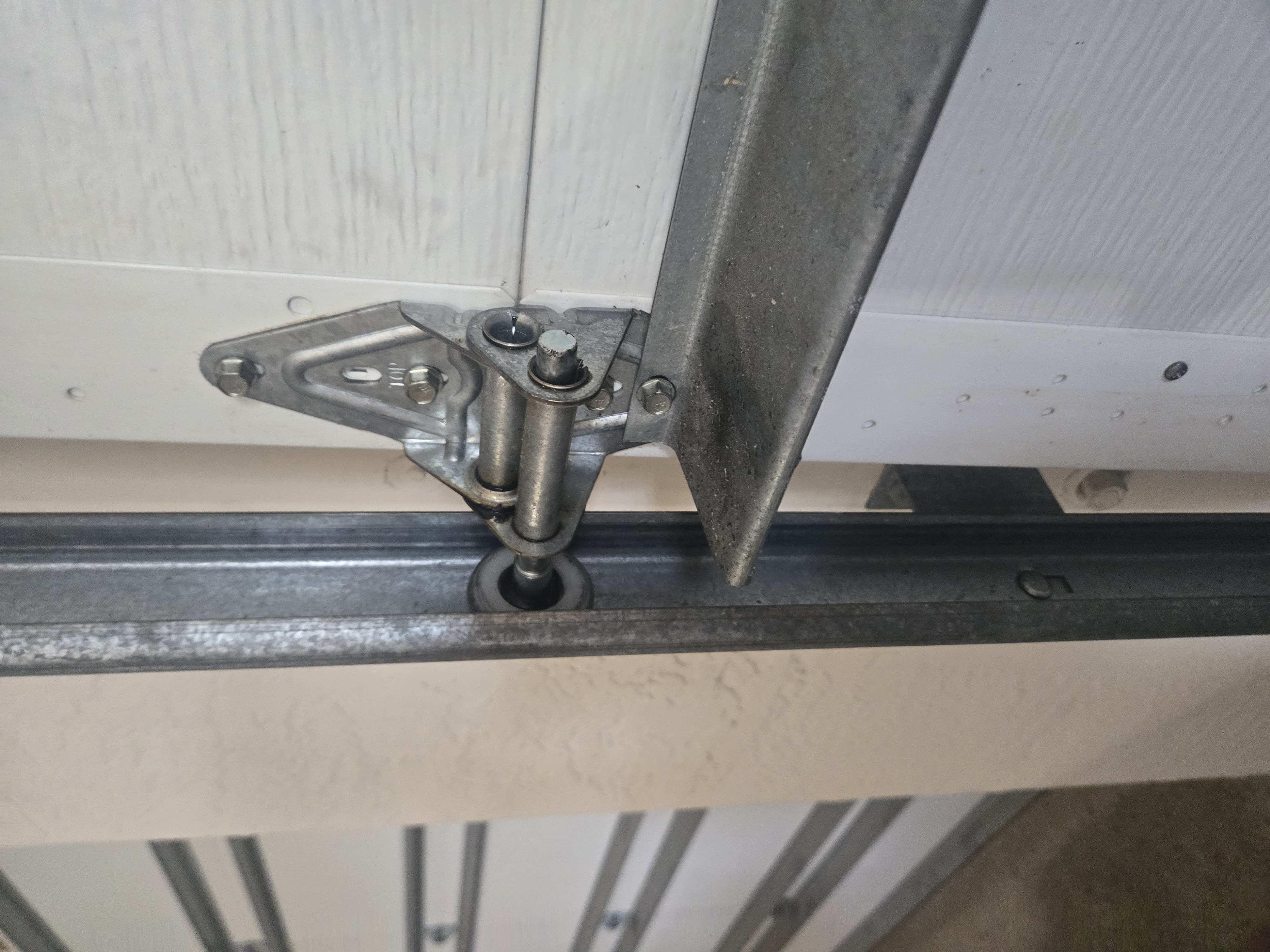 Replaced garage door roller after service