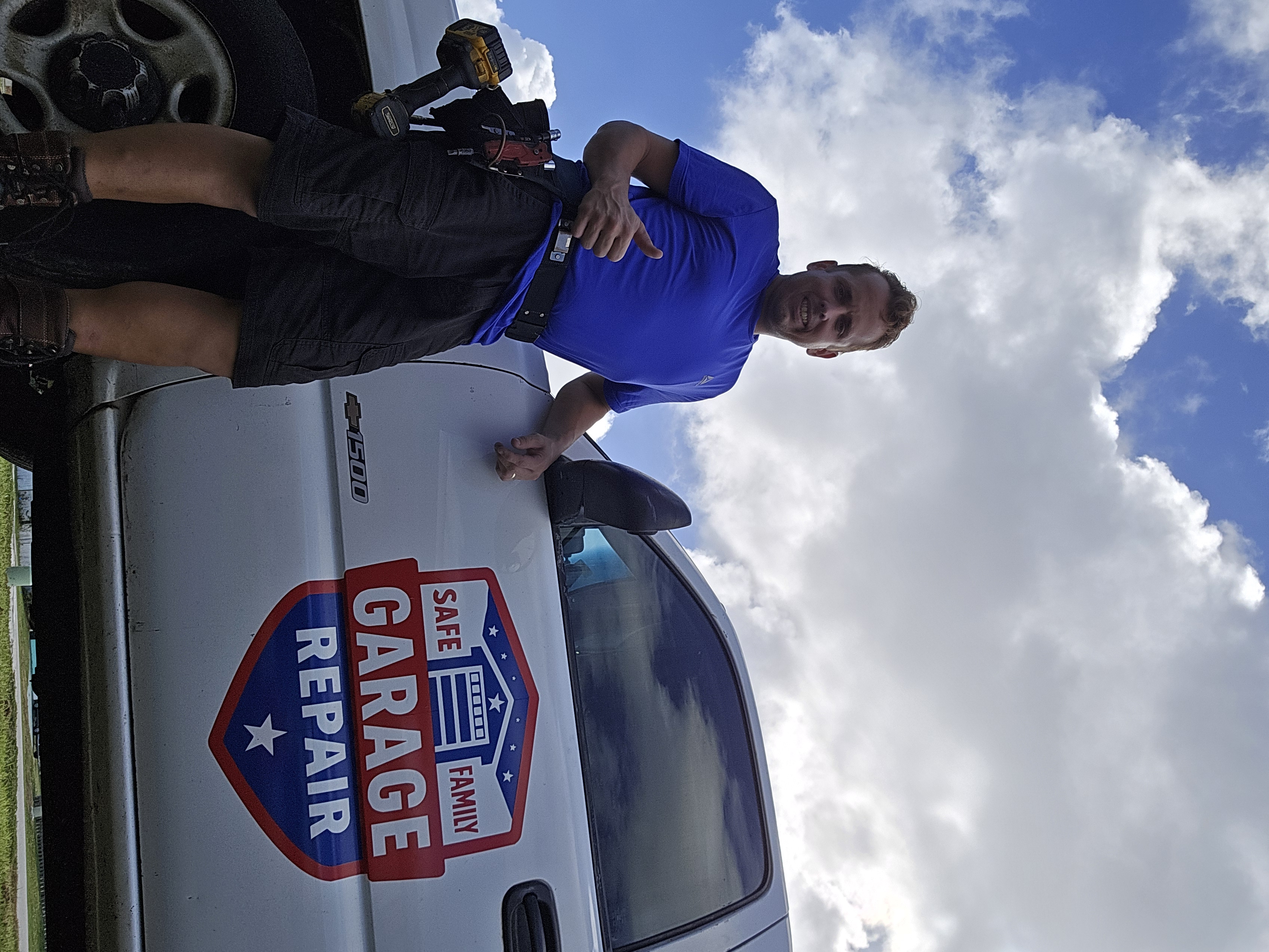 Owner technician standing by the Safe Family Garage Repair truck