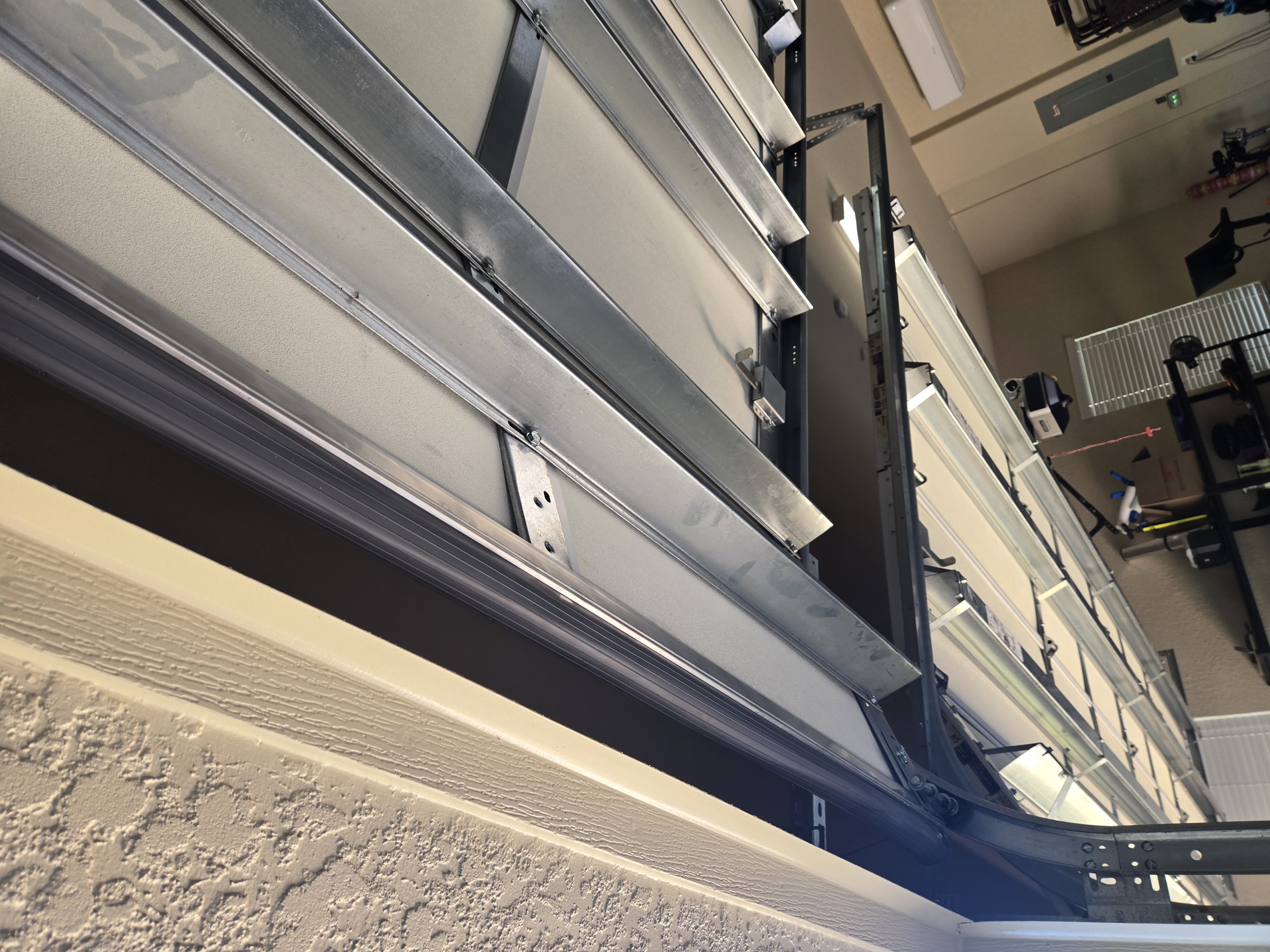 New weather seal installed along the bottom of the garage door